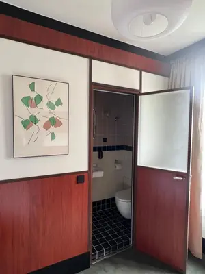Salle de bains dans l'établissement Hôtel Marguerite