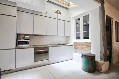 Cuisine ou kitchenette dans l'établissement Maison Marais