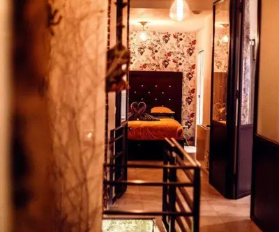 Un ou plusieurs lits dans un hébergement de l'établissement Maison Marais