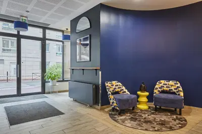 Coin salon dans l'établissement Appart'hôtel Odalys City - Paris Levallois