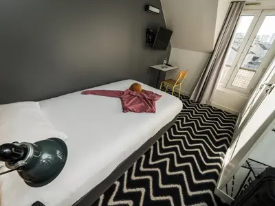 Un ou plusieurs lits dans un hébergement de l'établissement Ibis Styles Paris Place d'Italie - Butte Aux Cailles