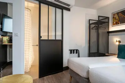 Un ou plusieurs lits dans un hébergement de l'établissement 26 Faubourg - Ex-Hotel de Reims