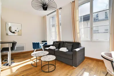 Coin salon dans l'établissement Residence central marais