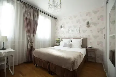 Un ou plusieurs lits dans un hébergement de l'établissement La Maison Gobert Paris Hotel Particulier