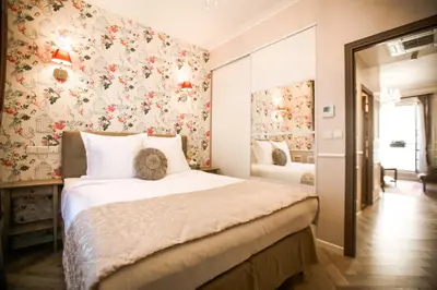 Un ou plusieurs lits dans un hébergement de l'établissement La Maison Gobert Paris Hotel Particulier