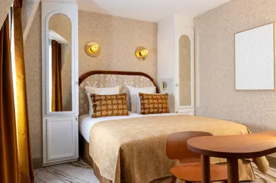 Un ou plusieurs lits dans un hébergement de l'établissement Hotel des Carmes by Malone