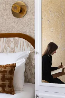 Un ou plusieurs lits dans un hébergement de l'établissement Hotel des Carmes by Malone