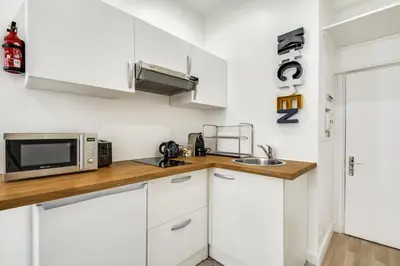 Cuisine ou kitchenette dans l'établissement Sweett - Aboukir II