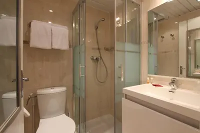 Salle de bains dans l'établissement Hôtel Chopin