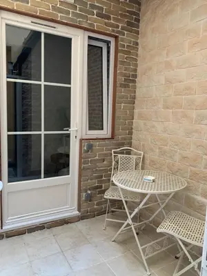 Terrasse ou espace extérieur de l'établissement Eiffel Tower studio with patio