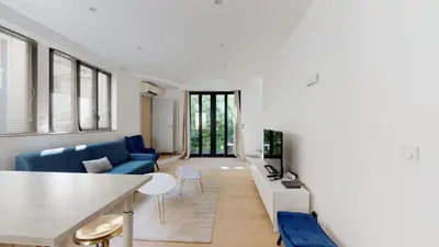 Coin salon dans l'établissement Stunning And Luxurious 3BR Loft 5min From Paris In The Heart Of Boulogne