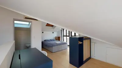 Un ou plusieurs lits dans un hébergement de l'établissement Stunning And Luxurious 3BR Loft 5min From Paris In The Heart Of Boulogne