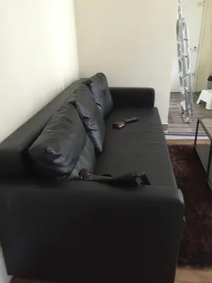 Coin salon dans l'établissement Appartement dans Le Marais