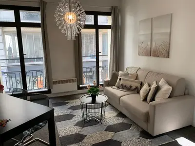 Coin salon dans l'établissement Sweet Home Paris Apartment