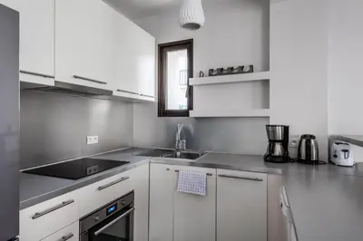 Cuisine ou kitchenette dans l'établissement Sweet Home Paris Apartment