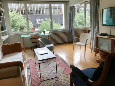 Télévision ou salle de divertissement dans l'établissement Standing-Montparnasse