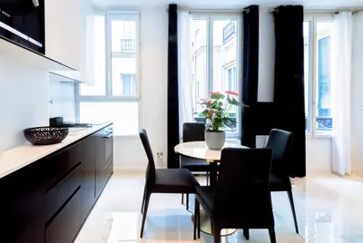 Coin salon dans l'établissement Champs-Élysées Executive Apartment