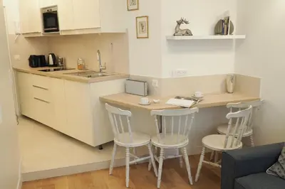 Cuisine ou kitchenette dans l'établissement Louvre Opera Design ChicSuites