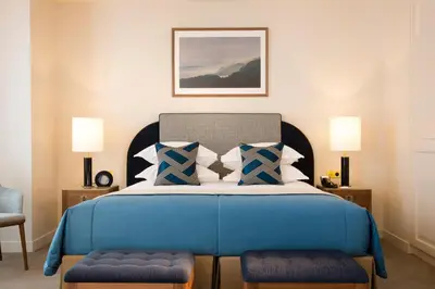 Un ou plusieurs lits dans un hébergement de l'établissement Le Tsuba Hotel