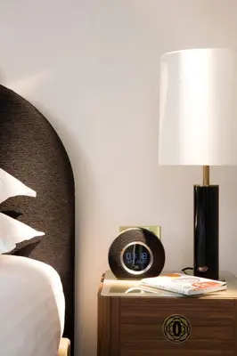 Un ou plusieurs lits dans un hébergement de l'établissement Le Tsuba Hotel