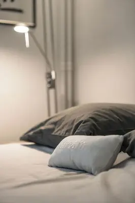 Un ou plusieurs lits dans un hébergement de l'établissement Le Studio 1517