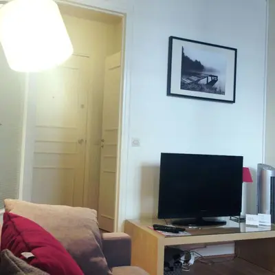 Télévision ou salle de divertissement dans l'établissement Le Studio 1517