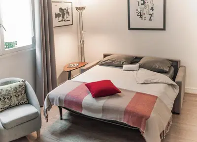 Un ou plusieurs lits dans un hébergement de l'établissement Le Studio 1517