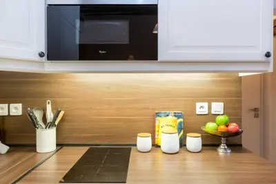 Cuisine ou kitchenette dans l'établissement Le Voyage En Isle
