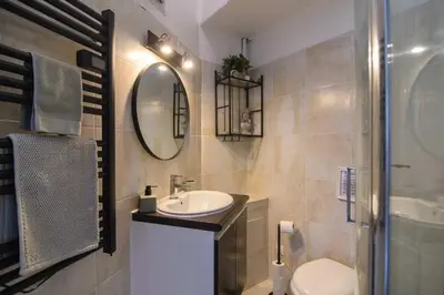 Salle de bains dans l'établissement La Charme Du Marais