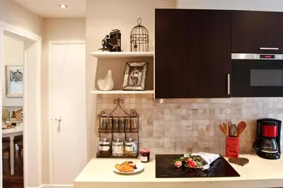 Cuisine ou kitchenette dans l'établissement Le Triomphe Elysees