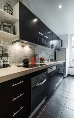 Cuisine ou kitchenette dans l'établissement Le Triomphe Elysees