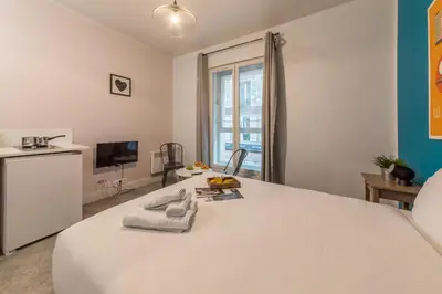 Un ou plusieurs lits dans un hébergement de l'établissement WS Hôtel de Ville - Le Marais