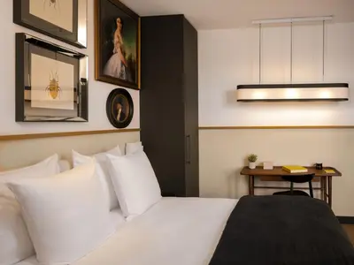 Un ou plusieurs lits dans un hébergement de l'établissement Solly Hôtel Paris