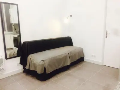 Un ou plusieurs lits dans un hébergement de l'établissement Le Logis de Montmartre