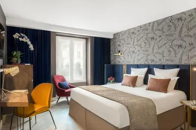 Un ou plusieurs lits dans un hébergement de l'établissement Hotel Opéra Opal