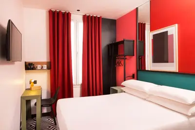 Un ou plusieurs lits dans un hébergement de l'établissement Hotel Pilime