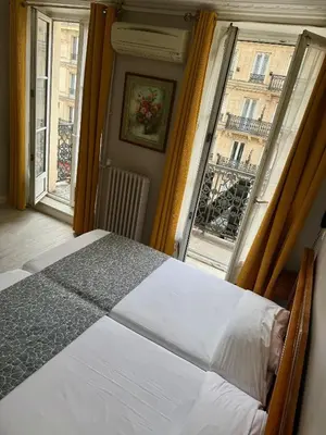 Un ou plusieurs lits dans un hébergement de l'établissement New Hôtel Gare Du Nord