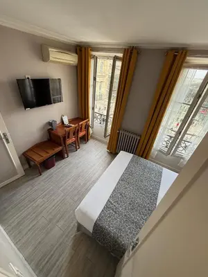 Un ou plusieurs lits dans un hébergement de l'établissement New Hôtel Gare Du Nord