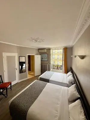 Un ou plusieurs lits dans un hébergement de l'établissement New Hôtel Gare Du Nord