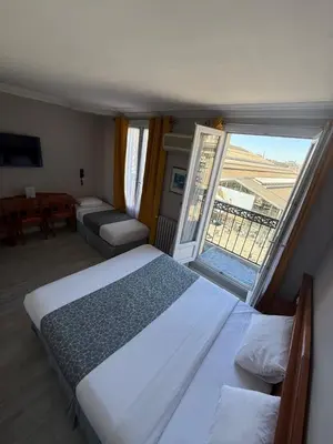 Un ou plusieurs lits dans un hébergement de l'établissement New Hôtel Gare Du Nord