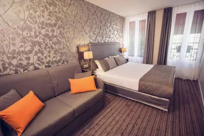 Coin salon dans l'établissement Timhotel Paris Gare de l'Est