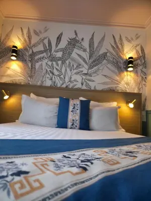 Un ou plusieurs lits dans un hébergement de l'établissement Amadeus Hotel