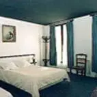 Un ou plusieurs lits dans un hébergement de l'établissement Avenir Hotel