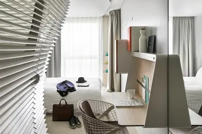 Télévision ou salle de divertissement dans l'établissement OKKO Hotels Paris Porte De Versailles