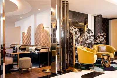 Coin salon dans l'établissement Hôtel Victor Hugo Paris Kléber