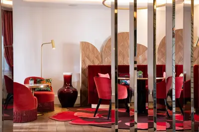 Coin salon dans l'établissement Hôtel Victor Hugo Paris Kléber