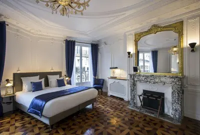 Un ou plusieurs lits dans un hébergement de l'établissement Vestay George V