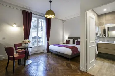 Un ou plusieurs lits dans un hébergement de l'établissement Vestay George V
