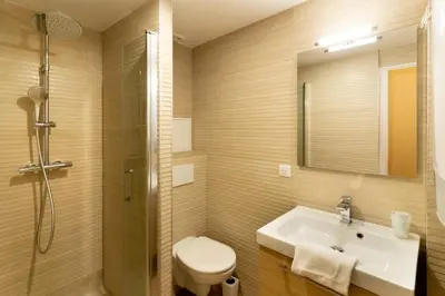Salle de bains dans l'établissement Hôtel Capfun Le Saint Germain, Paris