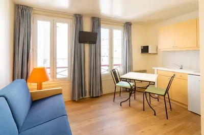 Coin salon dans l'établissement Hôtel Capfun Le Saint Germain, Paris